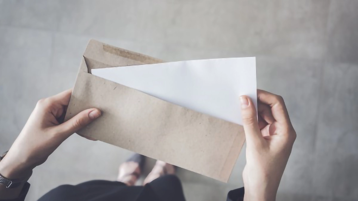Image shows a letter being received